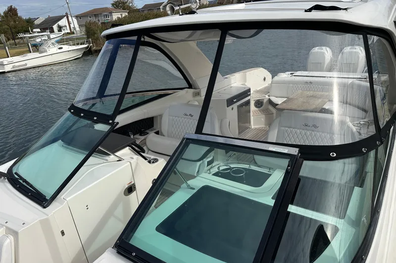  Yacht Photos Pics 2019 Sea Ray SLX 350 Outboard boat with sleek design and luxurious interior.