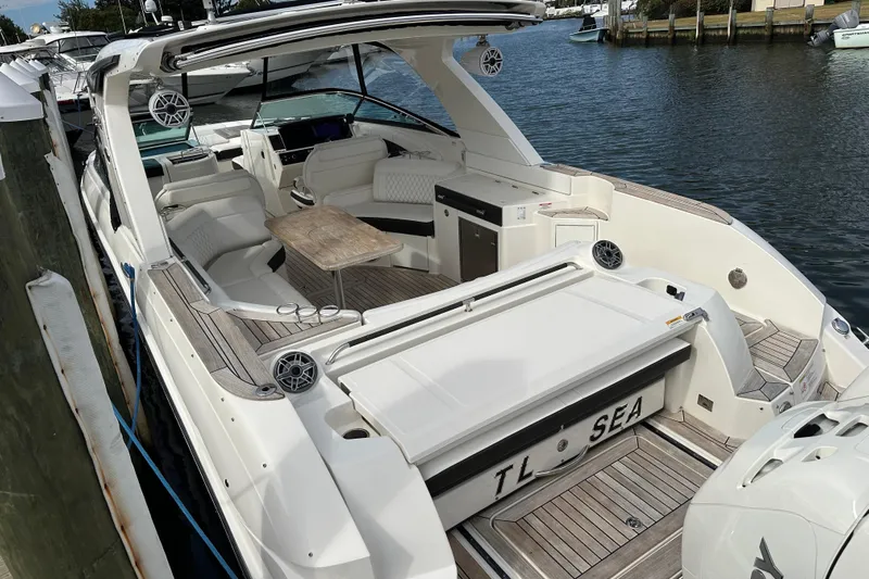  Yacht Photos Pics 2019 Sea Ray SLX 350 Outboard boat docked, featuring spacious seating and sleek design.