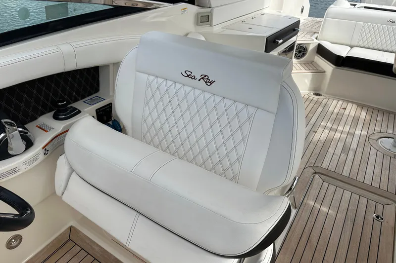  Yacht Photos Pics Luxurious interior of 2019 Sea Ray SLX 350 Outboard with elegant seating and wood flooring.