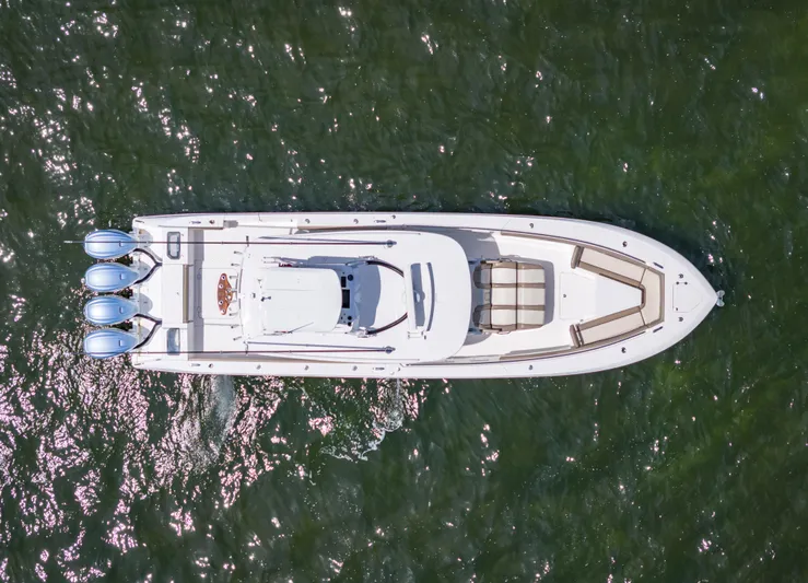 More Life Yacht Photos Pics Aerial view of 2020 Everglades 435 Center Console boat on water.