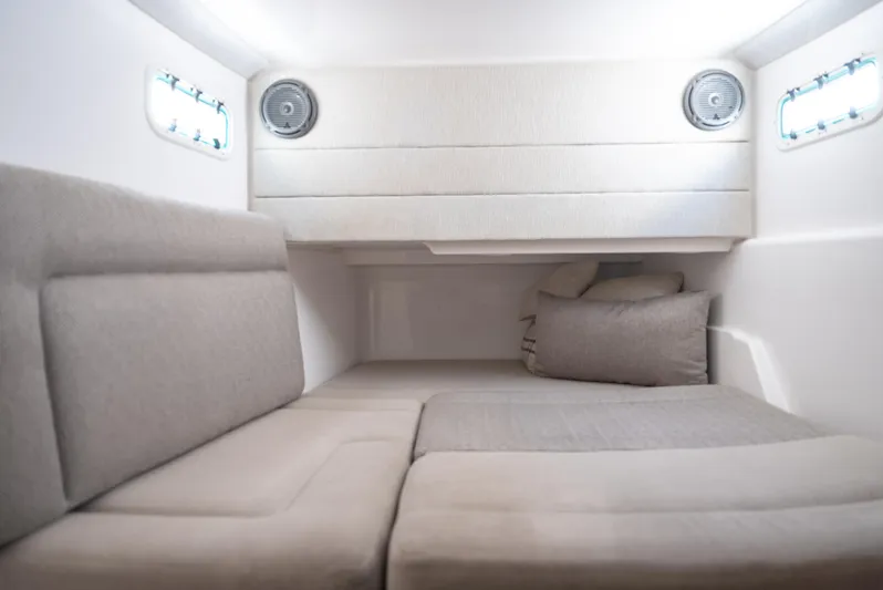 More Life Yacht Photos Pics Interior cabin of 2020 Everglades 435 Center Console boat, featuring comfortable seating and modern design.