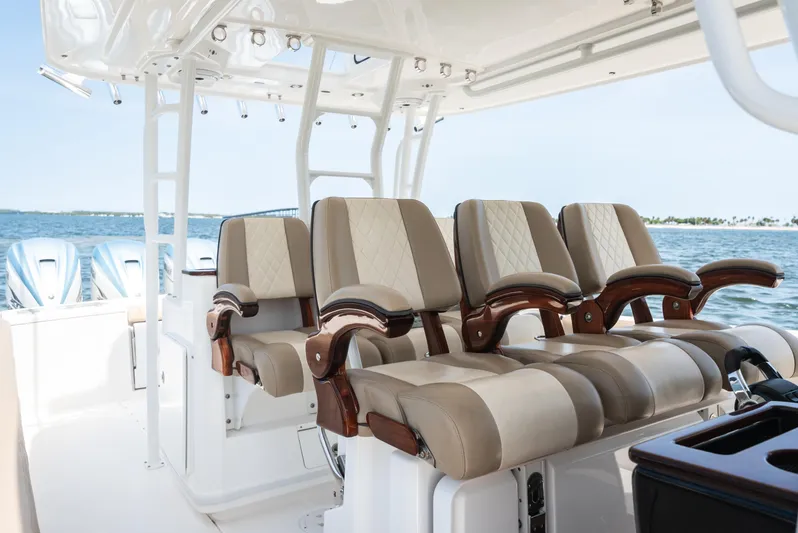 More Life Yacht Photos Pics 2020 Everglades 435 Center Console boat interior with luxurious seating and ocean view.