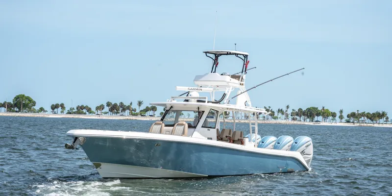 More Life Yacht Photos Pics 2020 Everglades 435 Center Console boat cruising on open water.