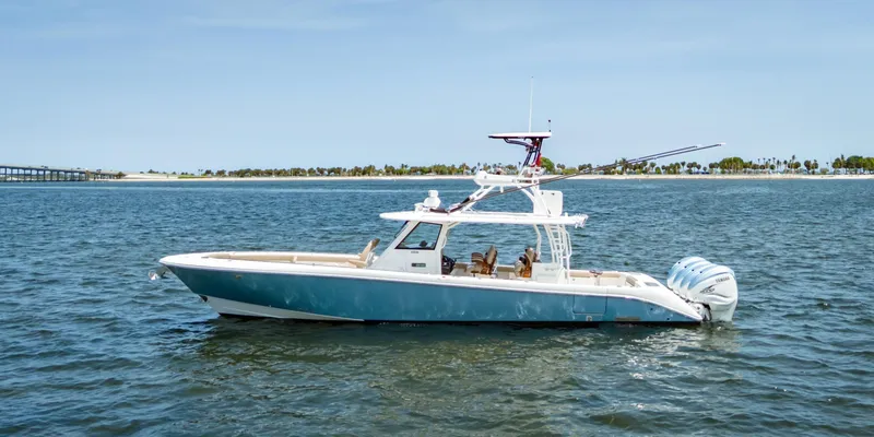 More Life Yacht Photos Pics 2020 Everglades 435 Center Console boat cruising on open water.