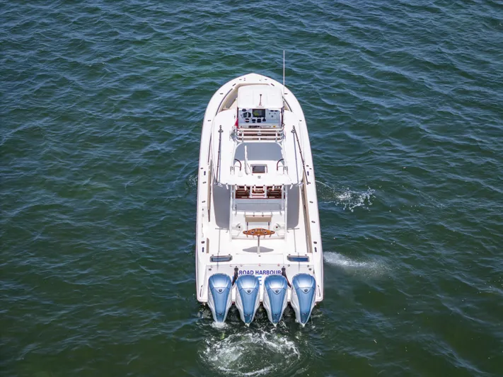 More Life Yacht Photos Pics 2020 Everglades 435 Center Console boat on open water, aerial view.