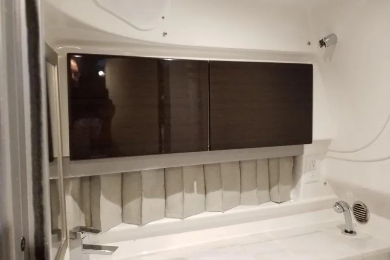  Yacht Photos Pics Interior of 2021 Formula 350 Sun Sport boat with sleek cabinetry and modern fixtures.