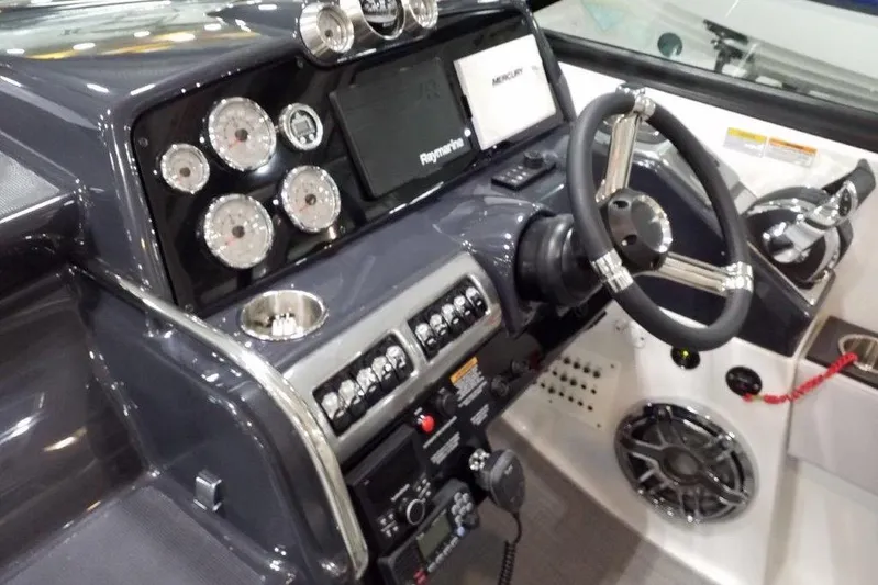  Yacht Photos Pics 2021 Formula 350 Sun Sport dashboard with gauges, steering wheel, and controls.