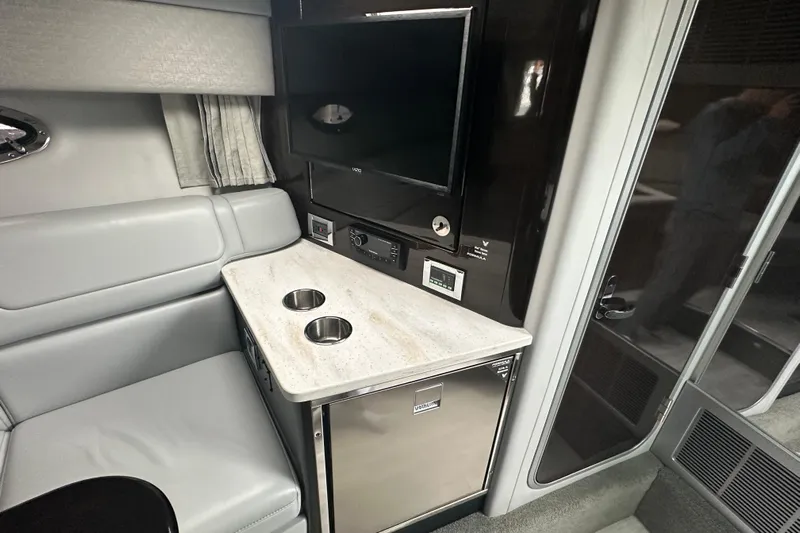  Yacht Photos Pics Interior of 2021 Formula 350 Sun Sport with seating, countertop, and mini fridge.