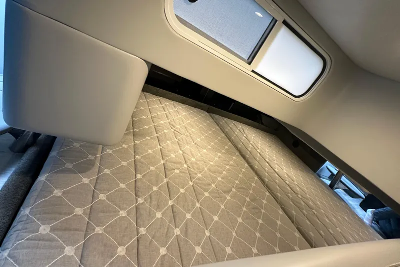  Yacht Photos Pics Interior cabin of 2021 Formula 350 Sun Sport with a comfortable bed and window.