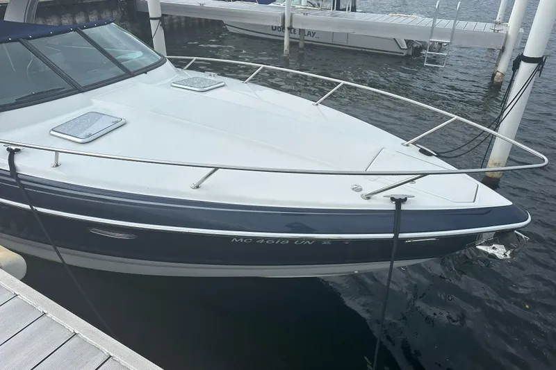  Yacht Photos Pics 2021 Formula 350 Sun Sport boat docked at marina, side view.