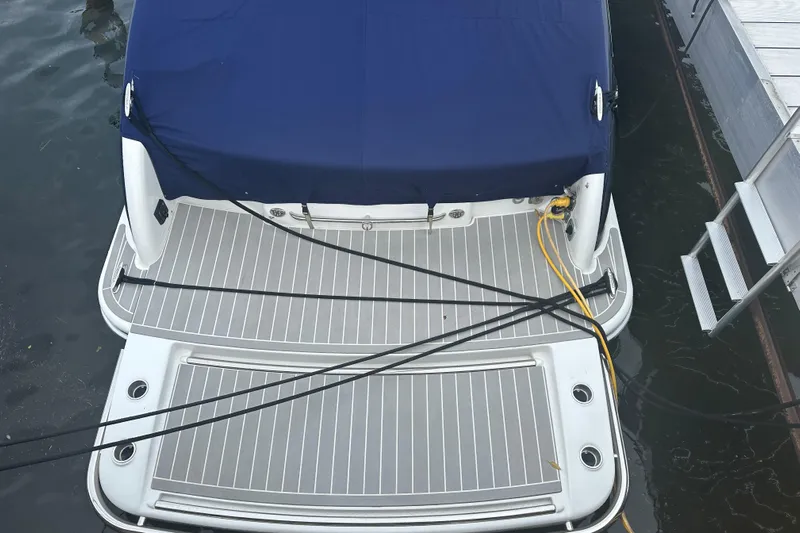  Yacht Photos Pics 2021 Formula 350 Sun Sport boat docked with blue cover and power cables.