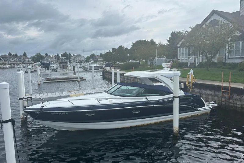  Yacht Photos Pics 2021 Formula 350 Sun Sport docked at a marina with overcast skies.