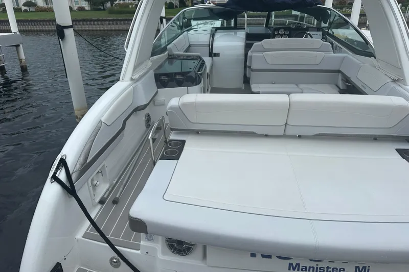  Yacht Photos Pics 2021 Formula 350 Sun Sport boat with spacious seating and sleek design, docked in Manistee, MI.