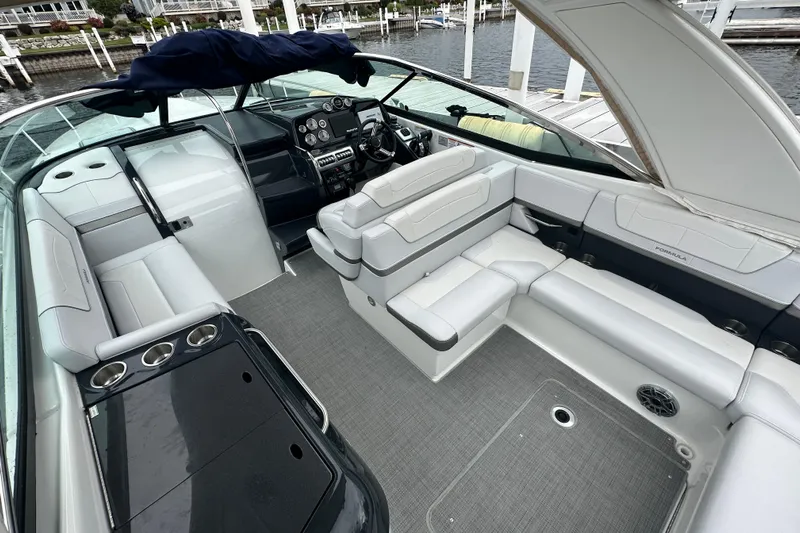  Yacht Photos Pics 2021 Formula 350 Sun Sport boat interior with luxurious seating and modern dashboard.
