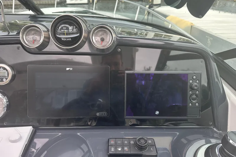  Yacht Photos Pics Dashboard of a 2021 Formula 350 Sun Sport boat with navigation instruments.