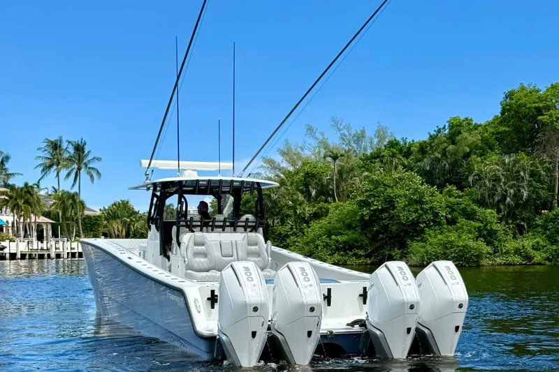  Yacht Photos Pics 2019 Freeman 42 LR boat with quad engines on a scenic waterway.