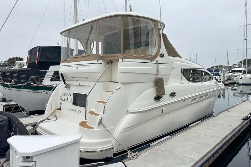 Pan-a-sea-ahh Yacht Photos Pics 2004 Sea Ray 390 Motor Yacht docked at a marina.