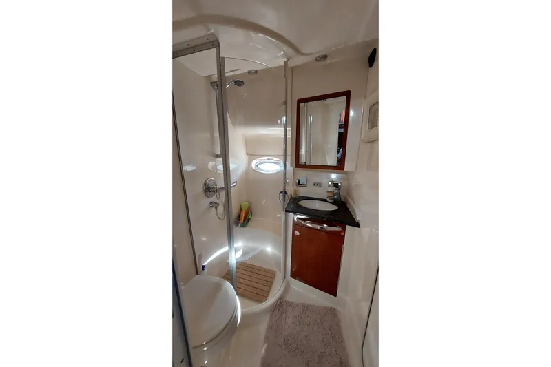 Pan-a-sea-ahh Yacht Photos Pics Luxurious bathroom in 2004 Sea Ray 390 Motor Yacht with shower and vanity.