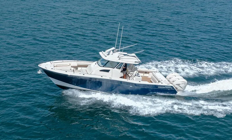 Carpe Diem Yacht Photos Pics 2019 Grady-White 376 Canyon boat cruising on open water.