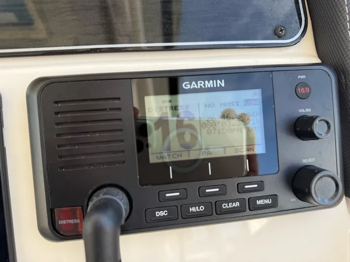 335-514 Brokerage Ron Yacht Photos Pics Garmin marine radio on 2023 Grady-White Freedom 335 boat dashboard.
