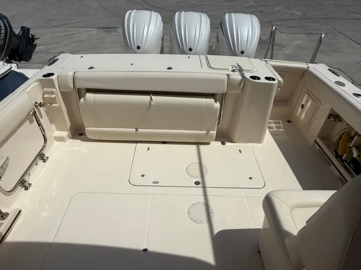 335-514 Brokerage Ron Yacht Photos Pics 2023 Grady-White Freedom 335 boat interior with seating and Yamaha engines.