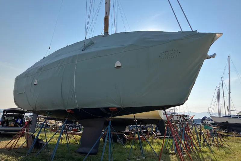 Celebration Yacht Photos Pics 2007 Tartan 3400 sailboat covered and supported on stands in a boatyard.
