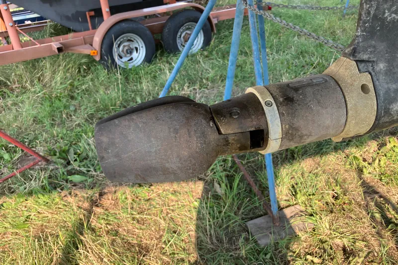Celebration Yacht Photos Pics Close-up of a 2007 Tartan 3400 sailboat propeller on grass.