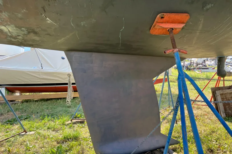 Celebration Yacht Photos Pics Tartan 3400 sailboat keel, 2007 model, supported on stands in a boatyard.