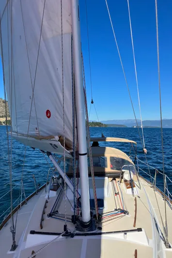 Celebration Yacht Photos Pics Sailing on a 2007 Tartan 3400 yacht in clear blue waters.