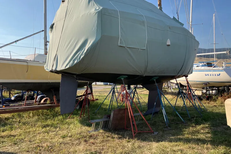 Celebration Yacht Photos Pics Covered 2007 Tartan 3400 sailboat on stands in a boatyard.