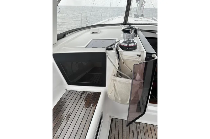  Yacht Photos Pics Cockpit of 2017 Beneteau Oceanis 45 sailboat with winch and teak flooring.