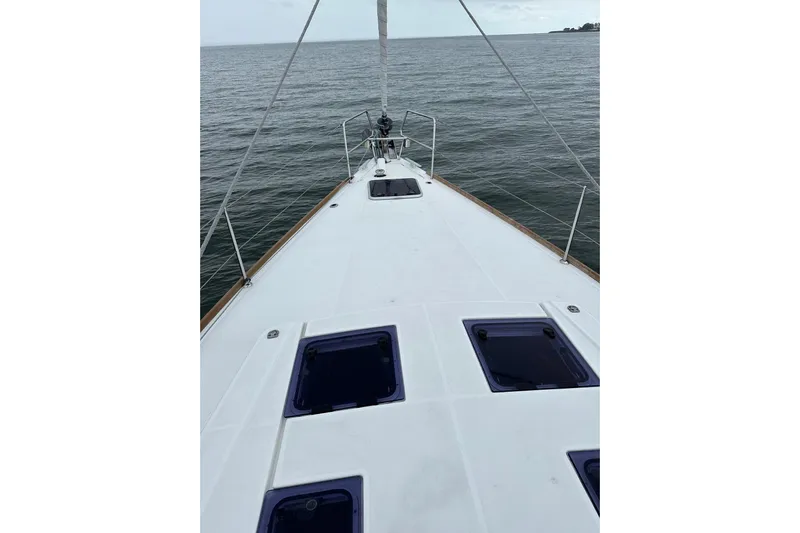  Yacht Photos Pics 2017 Beneteau Oceanis 45 yacht deck overlooking calm sea.