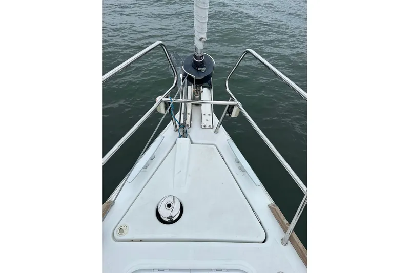  Yacht Photos Pics Bow of 2017 Beneteau Oceanis 45 sailboat with stainless steel railings.