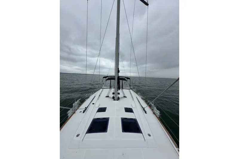  Yacht Photos Pics Sailing on a 2017 Beneteau Oceanis 45 yacht under cloudy skies.