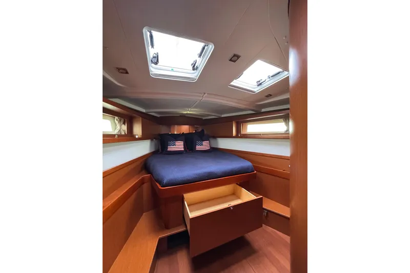  Yacht Photos Pics Cabin interior of 2017 Beneteau Oceanis 45 yacht with skylights and storage.