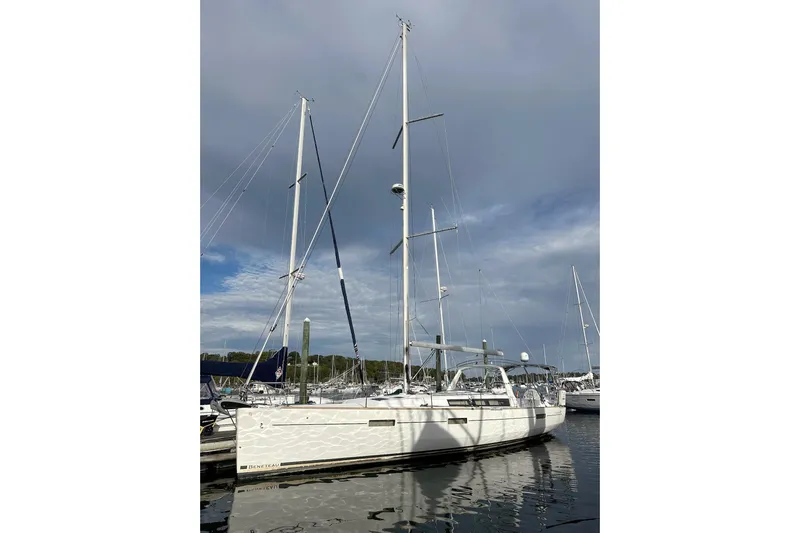  Yacht Photos Pics 2017 Beneteau Oceanis 45 sailboat docked under cloudy sky.