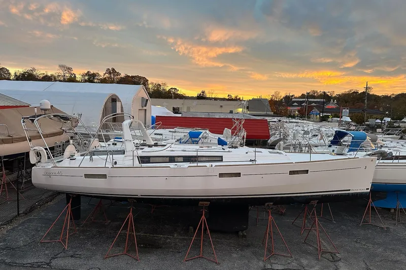  Yacht Photos Pics 2017 Beneteau Oceanis 45 sailboat on stands at sunset in a marina.