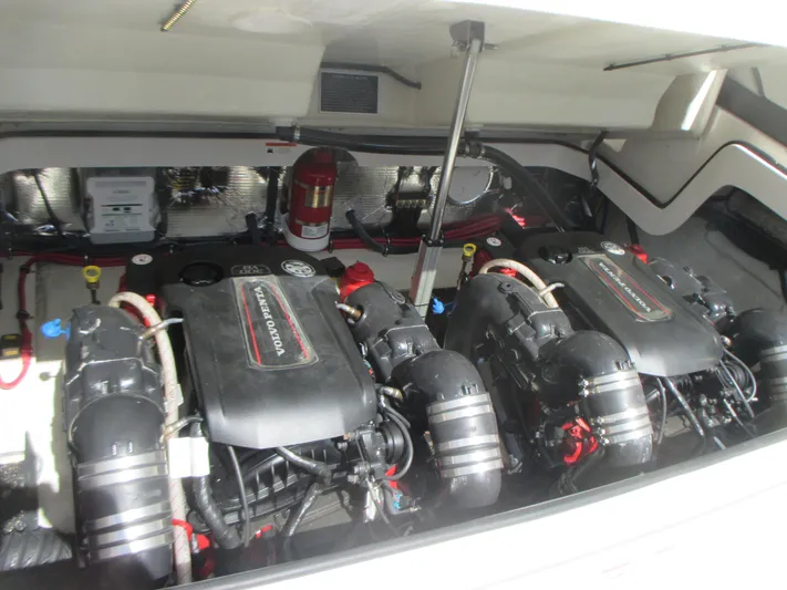  Yacht Photos Pics 2017 Regal 3200 Bowrider engine compartment with dual engines and fire extinguisher.