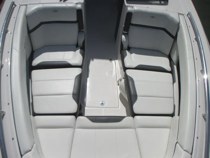  Yacht Photos Pics 2017 Regal 3200 Bowrider boat interior with white seating and sleek design.