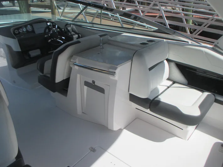  Yacht Photos Pics 2017 Regal 3200 Bowrider interior with sleek seating and modern dashboard.