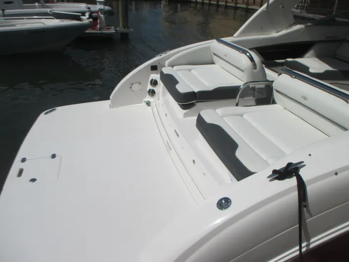 Yacht Photos Pics 2017 Regal 3200 Bowrider boat with spacious seating and sleek design.