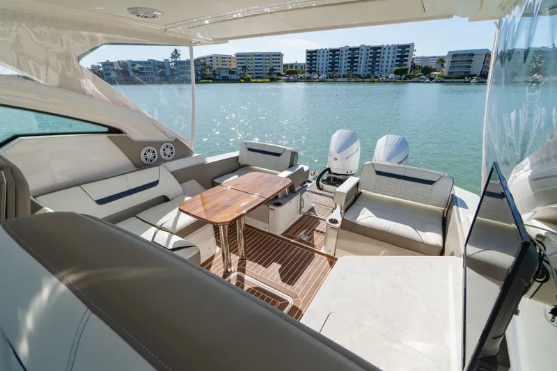  Yacht Photos Pics Interior of 2023 Tiara Yachts 34 LX overlooking the water.