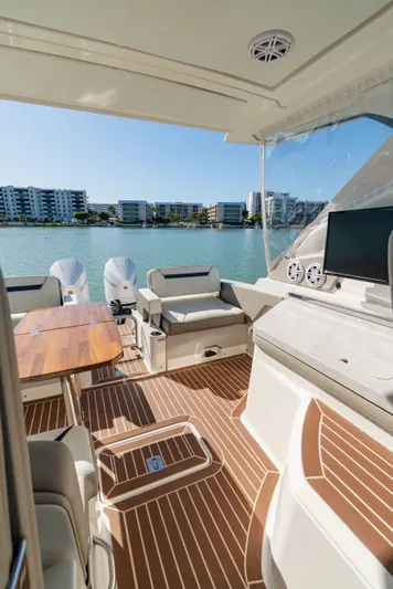  Yacht Photos Pics Interior of 2023 Tiara Yachts 34 LX overlooking the water.
