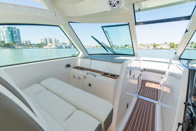  Yacht Photos Pics Interior of 2023 Tiara Yachts 34 LX with waterfront view.