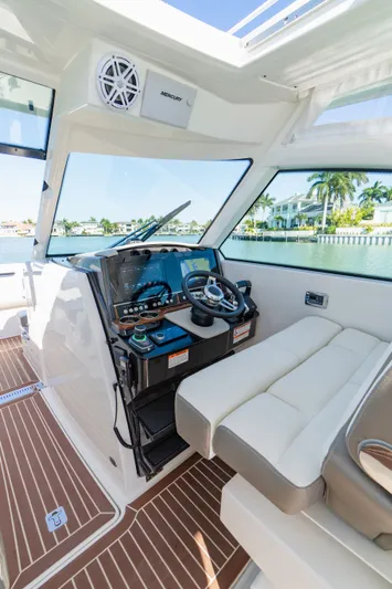  Yacht Photos Pics Interior of 2023 Tiara Yachts 34 LX with modern helm station.