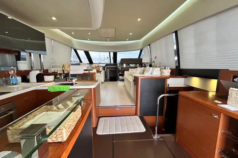  Yacht Photos Pics Luxurious interior of a 2014 Prestige 550 Fly yacht with modern furnishings.