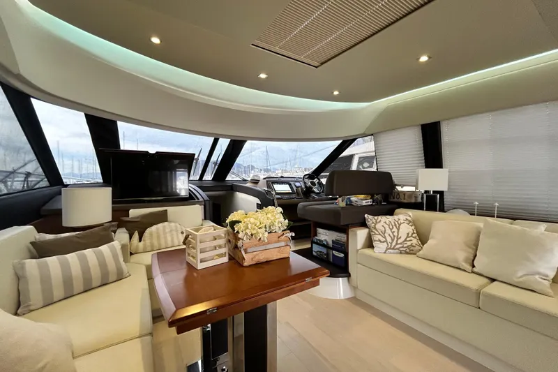  Yacht Photos Pics Luxurious interior of 2014 Prestige 550 Fly yacht with elegant seating and decor.