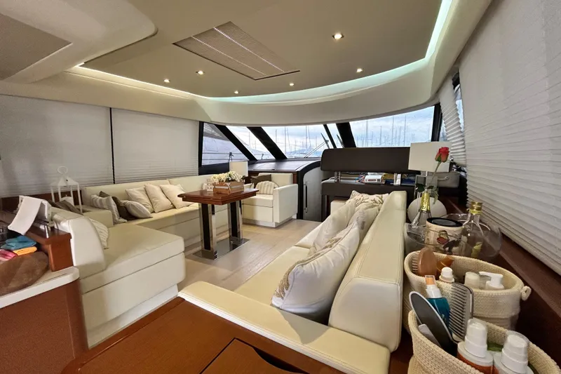  Yacht Photos Pics Luxurious interior of a 2014 Prestige 550 Fly yacht with elegant seating and decor.