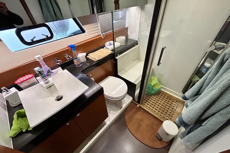  Yacht Photos Pics Luxurious bathroom in 2014 Prestige 550 Fly yacht with modern fixtures and shower.