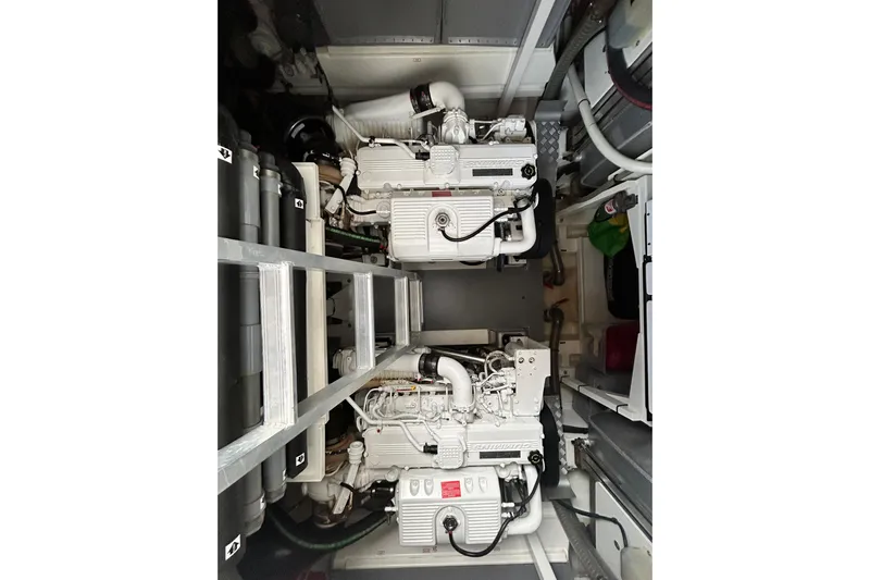  Yacht Photos Pics Engine room of a 2014 Prestige 550 Fly yacht, showcasing dual engines.